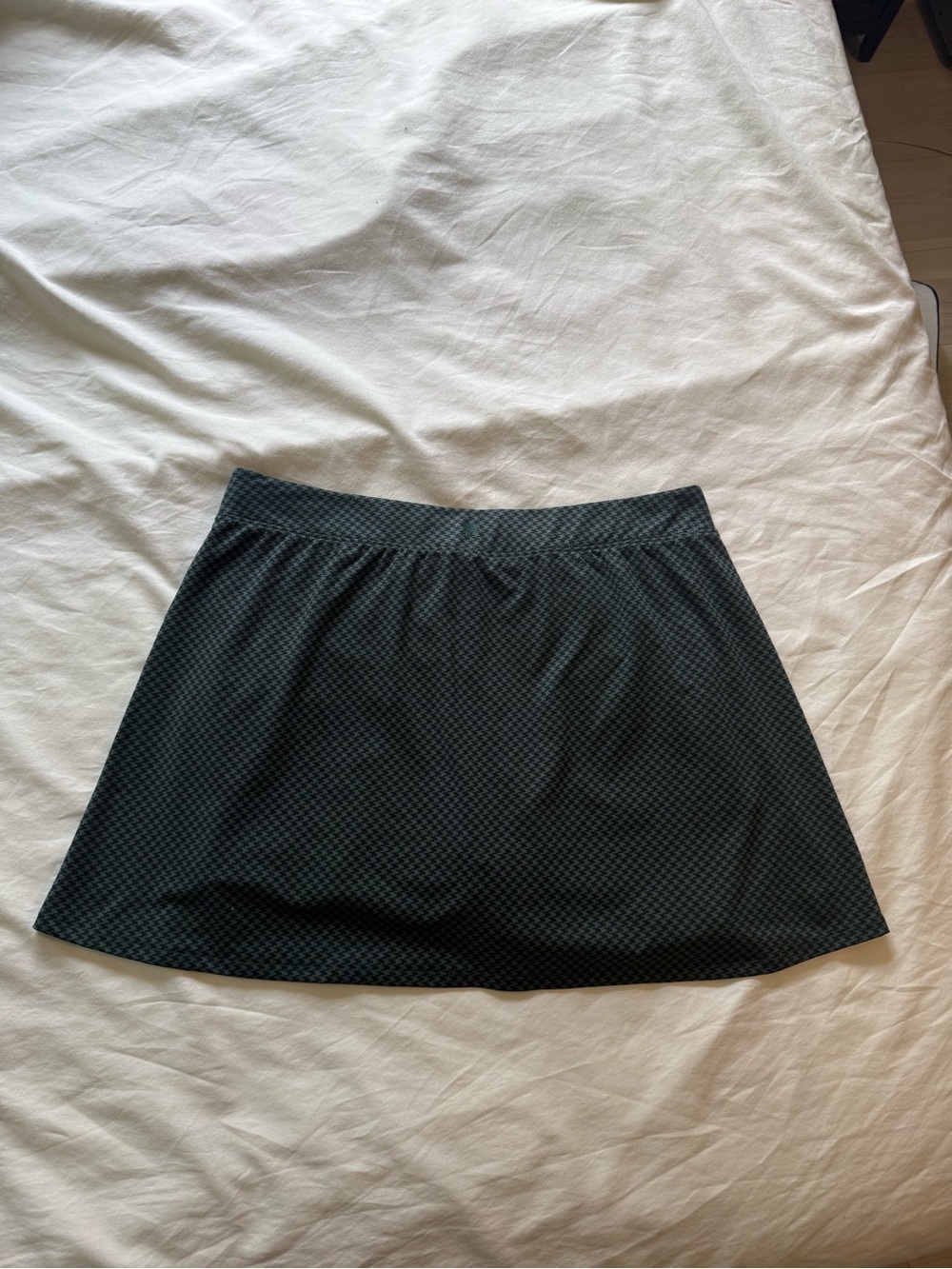 Green and black patterned tennis skirt